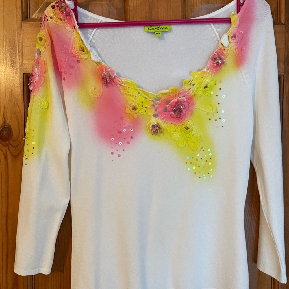 Colorful Women's Top with Floral Accents